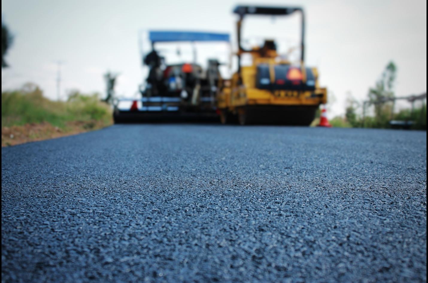 Resurfacing asphalt-based construction